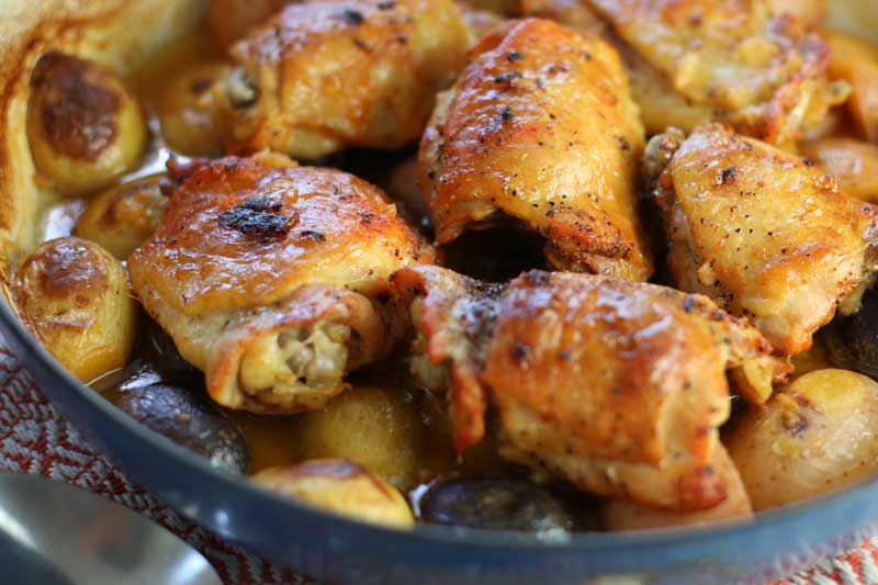 Juicy Baked Chicken & Potatoes in Mouthwatering Lemon Garlic Sauce