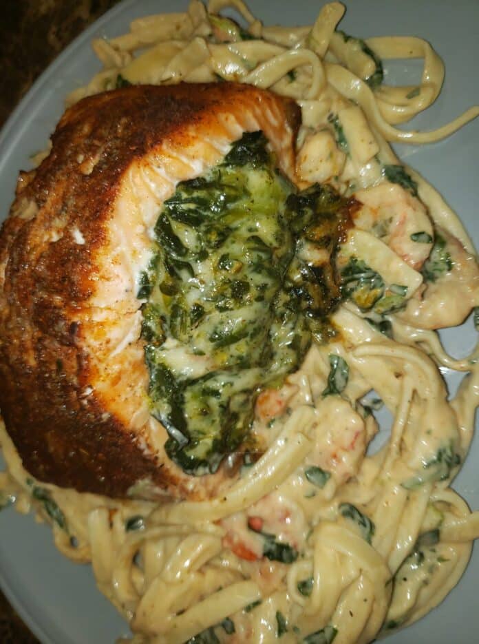 BLACKENED SALMON STUFFED WITH SPINACH AND PARMESAN CHEESE WITH SHRIMP AND SPINACH ALFREDO !