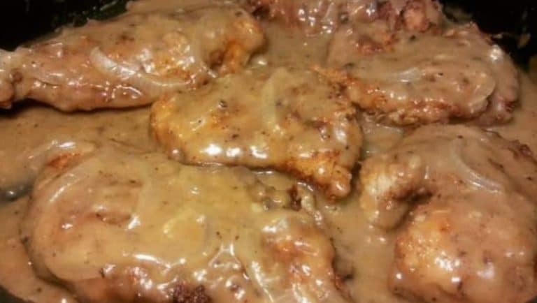 DEEP FRIED CHICKEN BREASTS AND SMOTHERED IN ONION GRAVY￼