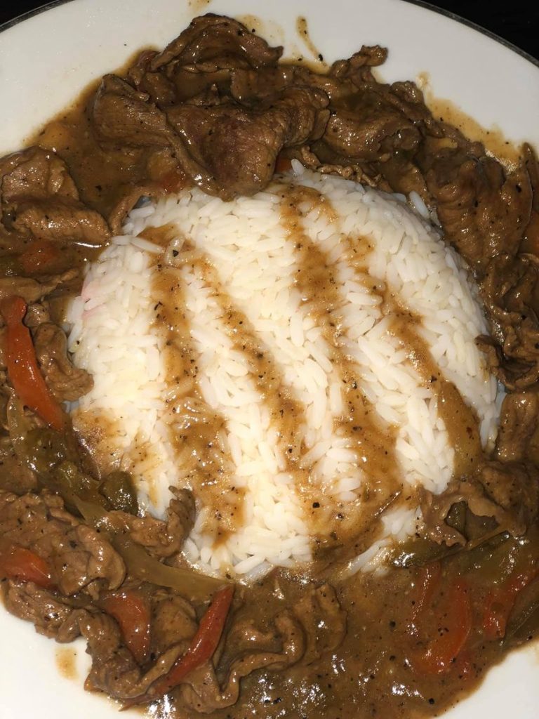 carne asada w. mexican rice & grilled red pepper & onion￼￼