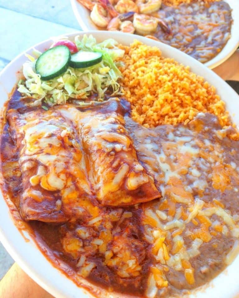 BEEF ENCHILADAS with extra cheese on top!!!