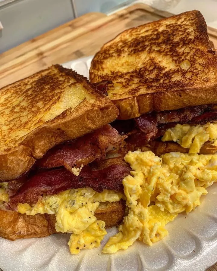 Air-Fryer Southern Bacon, Egg, and Cheese Breakfast Sandwich served on a plate