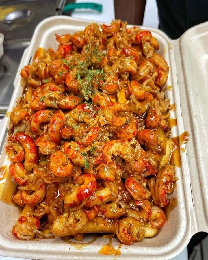 Delicious honey garlic crawfish fries served on a plate.