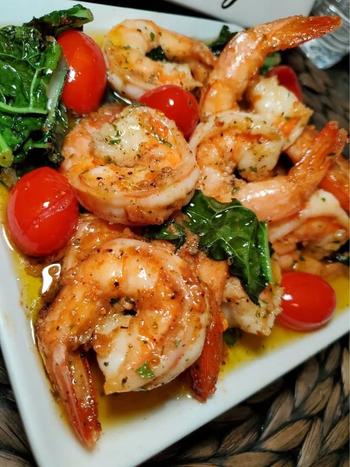 Sautéed shrimp with fresh spinach in a vibrant dish for a healthy meal.